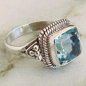 Elegant Silver and Blue Gemstone Ring